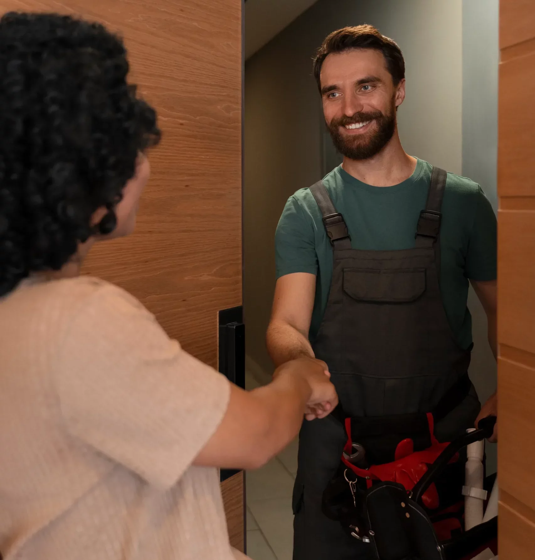 Appliance Technician Shaking Hands with customer