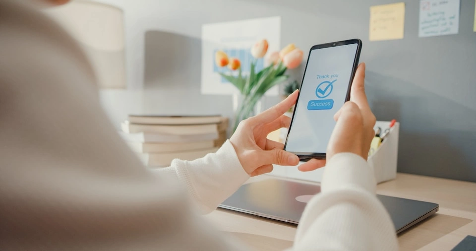 A woman book an appliance repair service